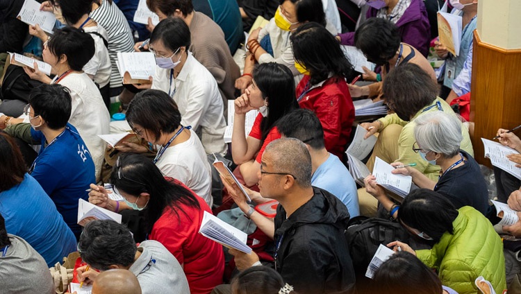 Members of the audience from Taiwan sitting inside the Main Tibetan Temple listening to Gaden Tri Rinpoché in Dharamsala, HP, India on October 2, 2023. Photo by Tenzin Choejor