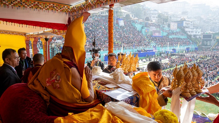 Dignitaries parading by with offerings for His Holiness the Dalai Lama during the Long Life Prayer at Paljor Stadium in Gangtok, Sikkim, India on December 12, 2023. Photo by Tenzin Choejor
