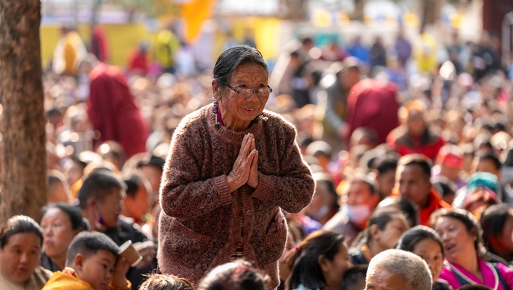 A member of the crowd paying her respects during His Holiness the Dalai Lama's teaching at Sed-Gyued Monastery in Salugara, West Bengal, India on December 14, 2023. Photo by Tenzin Choejor