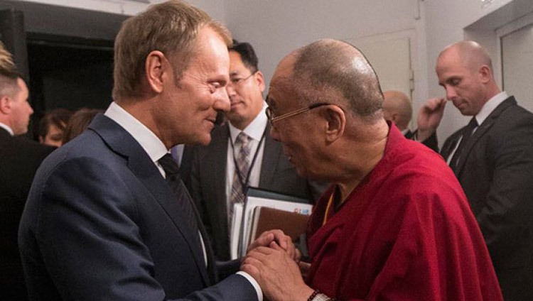 His Holiness the Dalai Lama with Prime Minister of Poland Donald Tusk before the 13th World Summit of Nobel Peace Laureates in Warsaw, Poland on October 23, 2013. Photo by Rady Ministrow