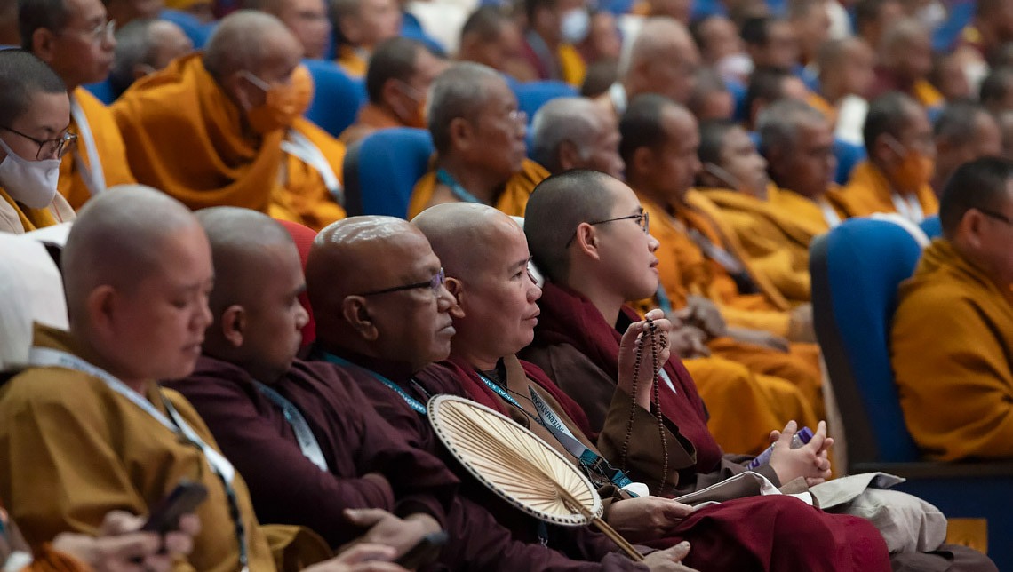 Sangha members from different Buddhist traditions listening to His Holiness the Dalai Lama speaking at the nauguration of the first International Sangha Forum at the International Convention Centre Bodhgaya in Bodhgaya, Bihar, India on December 20, 2023. Photo by Ven Zamling Norbu