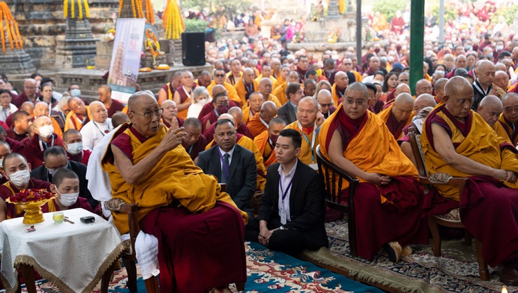His Holiness the Dalai Lama addressing the congregation gathered at the Mahabodhi Temple to join in prayers for world peace in Bodhgaya, Bihar, India on December 23, 2023. Photo by Tenzin Choejor
