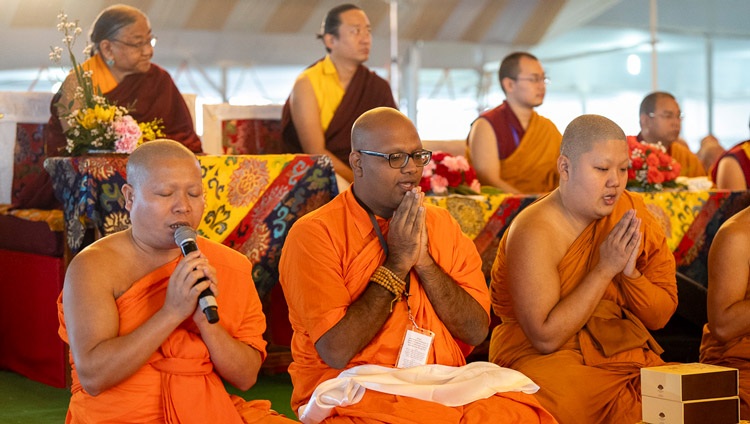 Theravadin monks chanting the ‘Mangala Sutta’ in Pali at the start of the first day of His Holiness the Dalai Lama's teachings at the Kalachakra Ground in Bodhgaya, Bihar, India on December 29, 2023. Photo by Tenzin Choejor