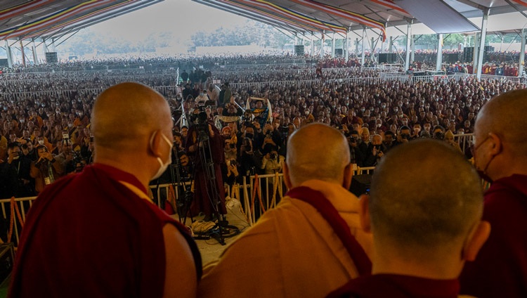His Holiness the Dalai Lama waving to the crowd of at the conclusion of the second day of teachings at the Kalachakra Ground in Bodhgaya, Bihar, India on December 30, 2023. Photo by Ven Zamling Norbu