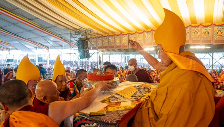 Ganden Tri Rinpoché presenting ritual offerings during the Long Life Prayer offered to His Holiness the Dalai Lama at the Kalachakra Ground in Bodhgaya, Bihar, India on January 1, 2024. Photo by Tenzin Choejor