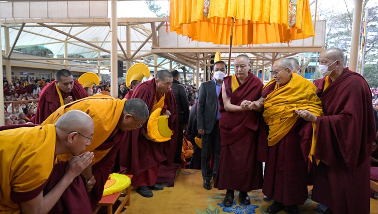 His Holiness the Dalai Lama walking through the Main Tibetan Temple courtyard on his way to give his teaching on the ‘Day of Offerings’ in Dharamsala, HP, India on February 24, 2024. Photo by Ven Zamling Norbu