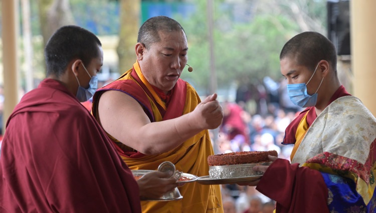 The Chant Master leading a mandala offering during His Holiness the Dalai Lama's teaching on the ‘Day of Offerings’ at the Main Tibetan Temple courtyard in Dharamsala, HP, India on February 24, 2024. Photo by Ven Zamling Norbu