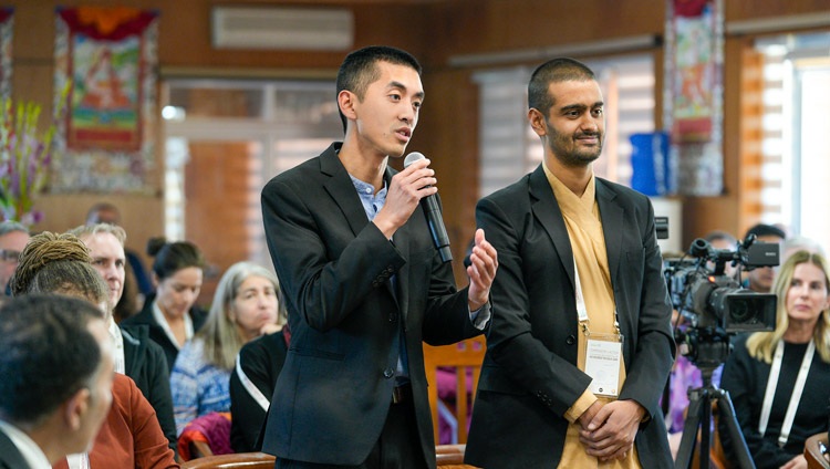 Shubham Sapkot from the USA working in Nepal and Tim Huang from Bhutan, wanting to know how schools can contribute to developing leaders with more compassion, asking His Holiness the Dalai Lama a question on the second day of conversation about leadership with a group of Dalai Lama Fellows at his residence in Dharamsala, HP, India on March 21, 2024. Photo by Ven Zamling Norbu