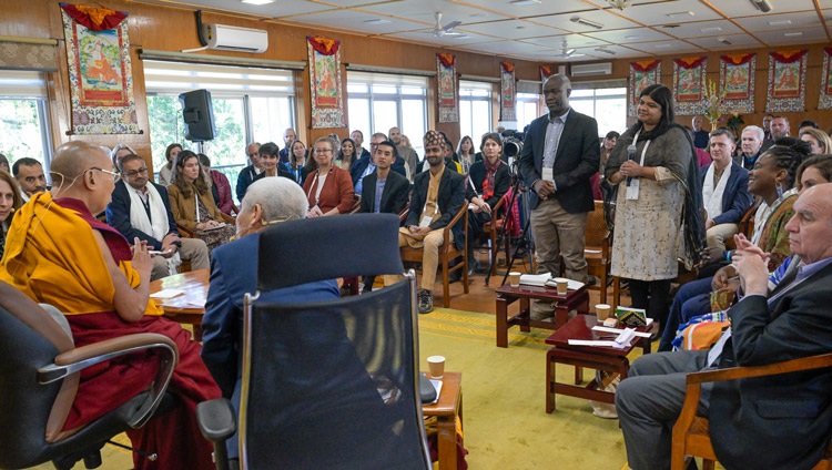 Ruchi Varma working in Delhi and Addi Mavengere in Zimbabwe, both trying to bring education to the under-privileged, asking His Holiness the Dalai Lama a question on the second day of conversation about leadership with a group of Dalai Lama Fellows at his residence in Dharamsala, HP, India on March 21, 2024. Photo by Ven Tenzin Jamphel