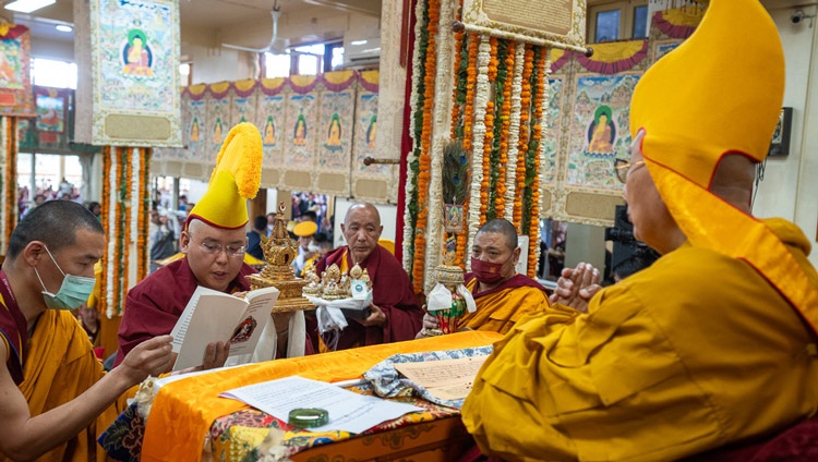 Ling Rinpoché presenting a series of offerings to His Holiness the Dalai Lama during the Long Life Prayer at the Main Tibetan Temple in Dharamsala, HP, India on April 3, 2024. Photo by Ven Tenzin Jamphel