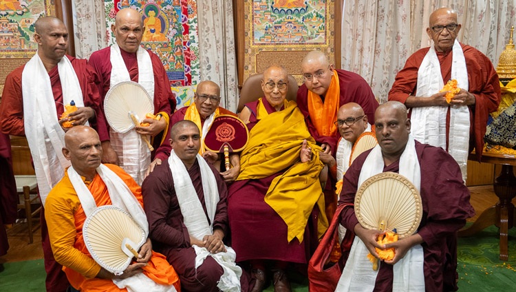 Members of the delegation that offered a relic of the Buddha pose with for a photo with His Holiness the Dalai Lama at his residence in Dharamsala, HP, India on April 4, 2024. Photo by Tenzin Choejor
