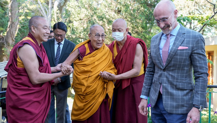 Professor Arthur Brooks leading the way as His Holiness the Dalai Lama reaches the meeting hall at his residence for the second day of discussion with groups from Harvard University in Dharamsala, HP, India on April 9, 2024. Photo by Tenzin Choejor