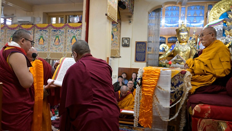 Lamaiin Gegeen reading an appeal to His Holiness the Dalai Lama as the second day of teachings at the Main Tibetan Temple in Dharamsala, HP, India on April 20, 2024. Photo by Ven Zamling Norbu