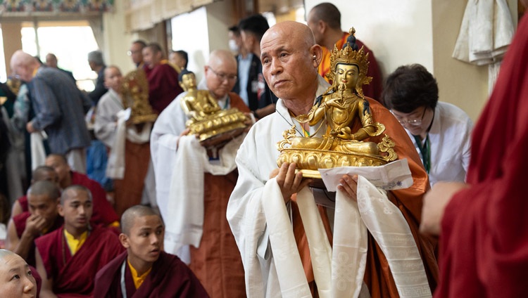 A procession of offerings as a feast offering was made at the conclusion of the Mahakala permission given by His Holiness the Dalai Lama at the Main Tibetan Temple in Dharamsala, HP, India on May 18, 2024. Photo by Tenzin Choejor