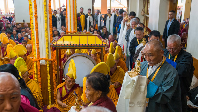 Members of the Dhanglob community bearing offerings for His Holiness the Dalai Lama during Long Life Prayers at the Main Tibetan Temple in Dharamsala, HP, India on October 31, 2025. Photo by Tenzin Choejor