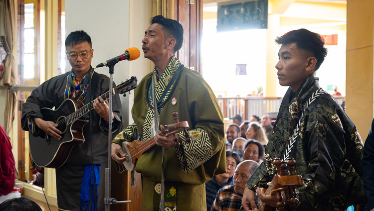 Three young men performing a song for His Holiness the Dalai Lama's Long Life at the Main Tibetan Temple in Dharamsala, HP, India on October 31, 2025. Photo by Ven Zamling Norbu