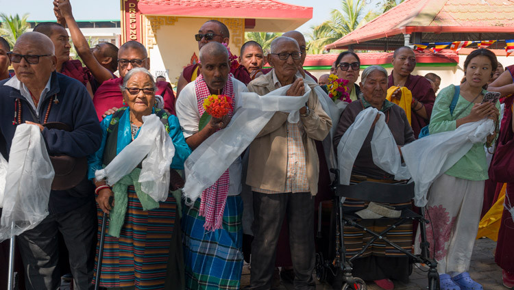 Members of the local community lining the roads welcoming His Holiness the Dalai Lama as his motorcade makes its way to Drepung Gomang Monastery in Mundgod, Karnataka, India on December 12, 2025. Photo by Tenzin Choejor