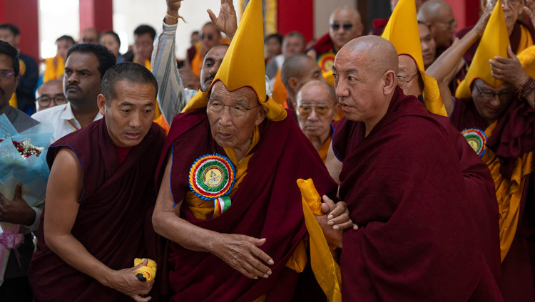 The Ganden Tripa waiting to greet His Holiness the Dalai Lama on his arrival at Drepung Gomang Monastery in Mundgod, Karnataka, India on December 12, 2025. Photo by Tenzin Choejor