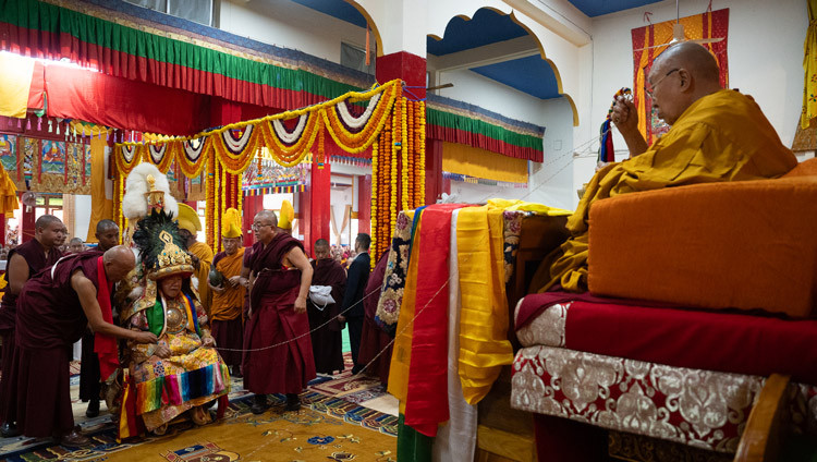he Nechung Oracle taking a seat facing His Holiness the Dalai Lama during the Long Life Prayers  for His Holiness at Drepung Lachi Assembly Hall in Mundgod, Karnataka, India on December 24, 2025. Photo by Tenzin Choejor