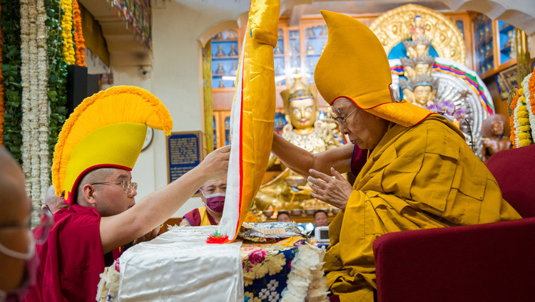 Ling Rinpoché offering a Long-Life Arrow to His Holiness the Dalai Lama during the Long Life Offering Ceremony at the Main Tibetan Temple in Dharamsala, HP, India on March 25, 2026. Photo by Tenzin Choejor