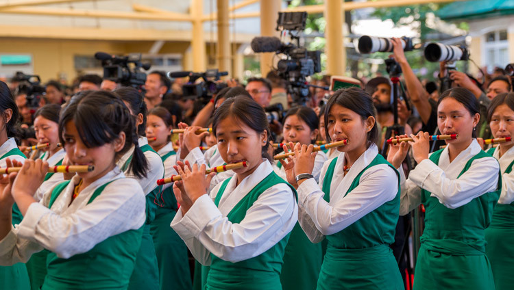 A group of Tibetan students leading in the singing of the Tibetan and Indian national anthems at the Swearing-in-Ceremony at the Main Tibetan Temple courtyard in Dharamsala, HP, India on May 27, 2026. Photo by Tenzin Choejor