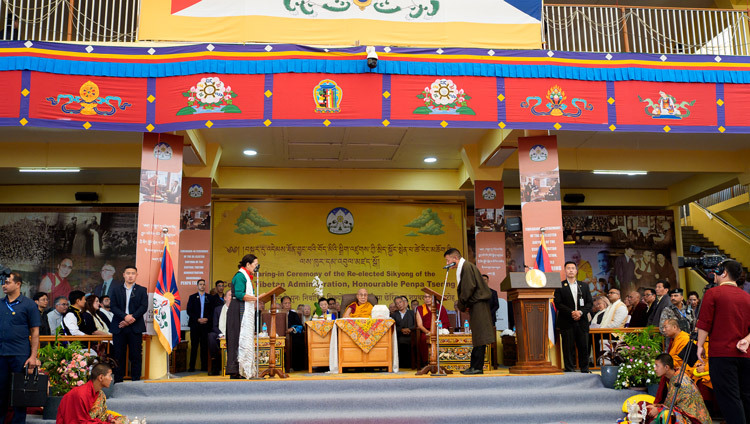 The Chief Justice Commissioner of the Tibetan Supreme Justice Commission, Yeshi Wangmo, giving the oathof Sikyong to Penpa Tsering at the Main Tibetan Temple courtyard in Dharamsala, HP, India on May 27, 2026. Photo by Tenzin Choejor