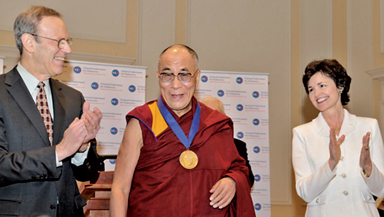 His Holiness the Dalai Lama being honoured with the Democracy Service Medal by the National Endowment for Democracy in Washington DC, USA on 19 February 2010.