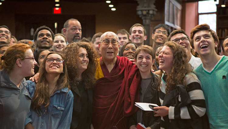 His Holiness the Dalai Lama poses for photos after his interactive session with students at Princeton University's Chancellor Green Library in Princeton, New Jersey on October 28, 2014. (Photo by Denise Applewhite)