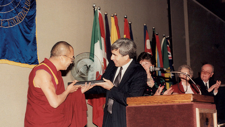 His Holiness the Dalai Lama accepting the Distinguished Peace Leadership Award from David Krieger, Executive Director of the Nuclear Age Peace Foundation, in Santa Barbara, California, USA on April 6, 1991.