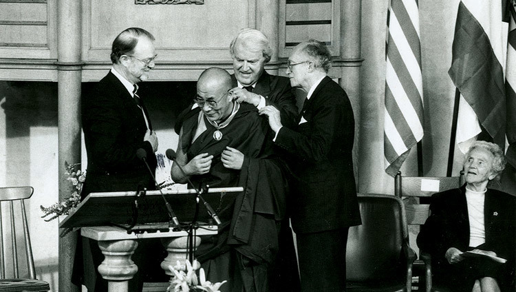 His Holiness the Dalai Lama being presented with the Franklin D. Roosevelt Freedom Medal by William J. Vanden Henvel, President of the Franklin and Eleanor Roosevelt Institute in Middelburg, USA, on June 4, 1994.