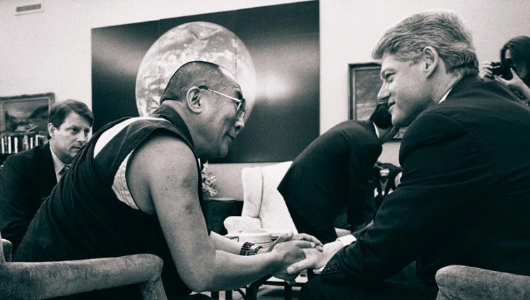 US President Bill Clinton talks with His Holiness the Dalai Lama as Vice President Al Gore looks on during a meeting at the White House in Washington DC, USA on April 27. 1993. (Official White House Photo)