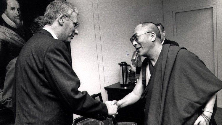 His Holiness the Dalai Lama greeting Minister of Foreign Affairs of The Netherlands Hans van den Broek in Amsterdam, the Netherlands on September 10, 1990.