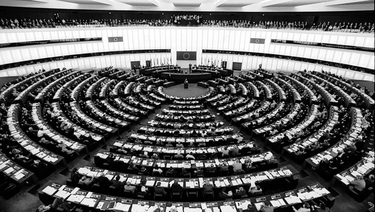 His Holiness the Dalai Lama addressing the European Parliament in Strasbourg, France on October 24, 2001. (Photo by Manuel Bauer)